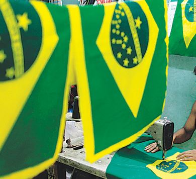 Tailors making flag of Brazil in Bangladesh